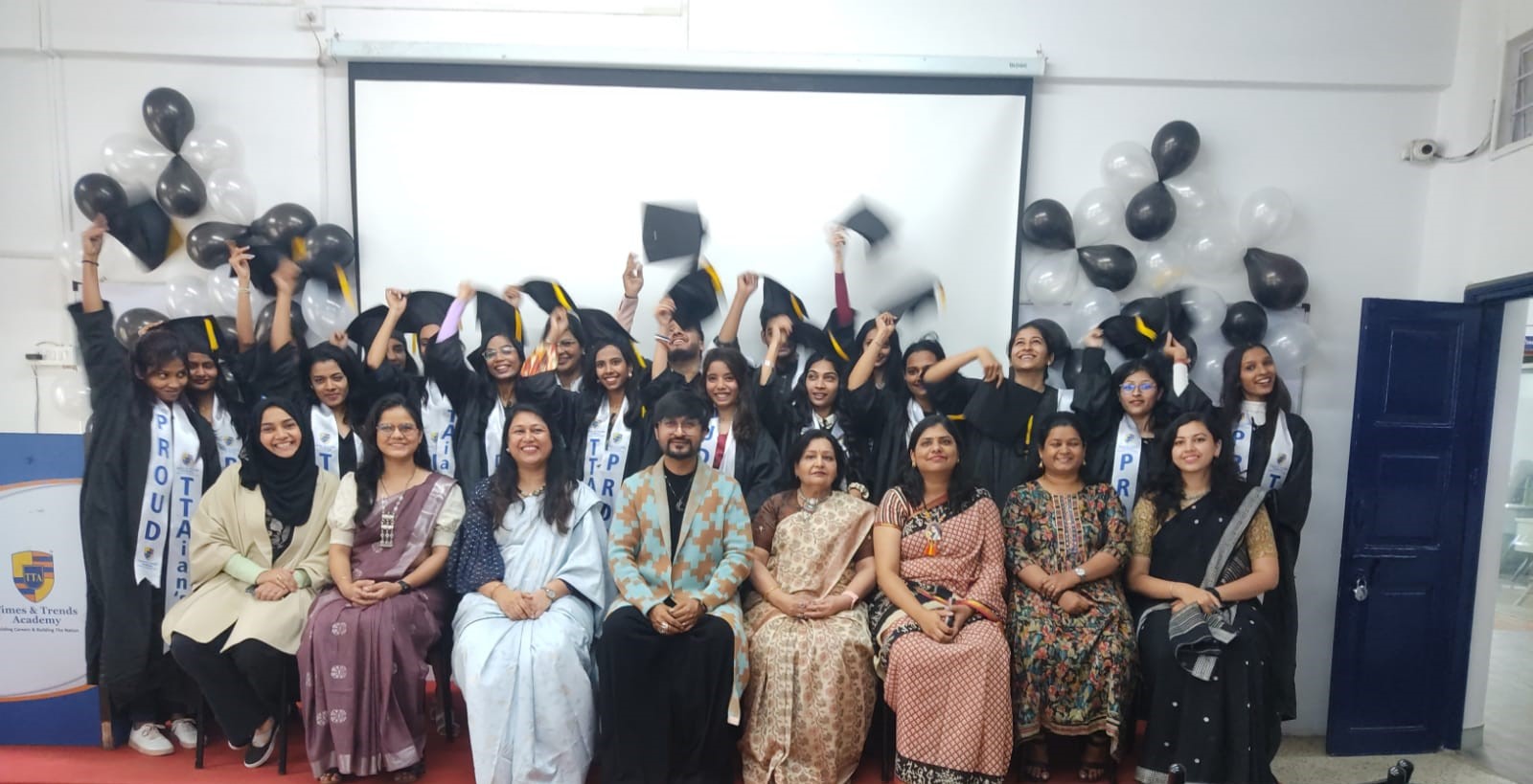 INIFD-E Pune fashion design students working on garments and portfolios for Batch 2026